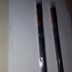 Two Luxie 140 brushes